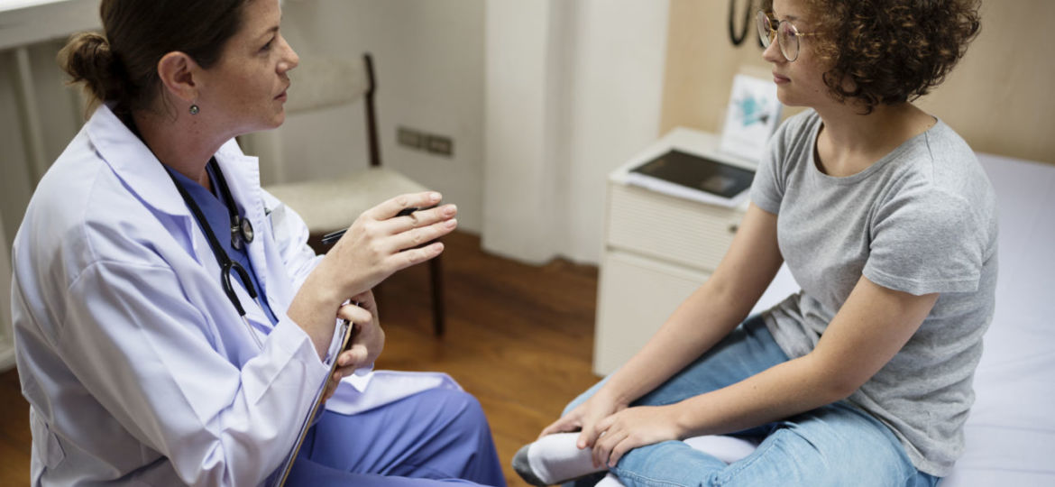 Doctor is checking a patient